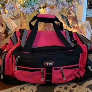 Pink Calpak Rolling Duffle
